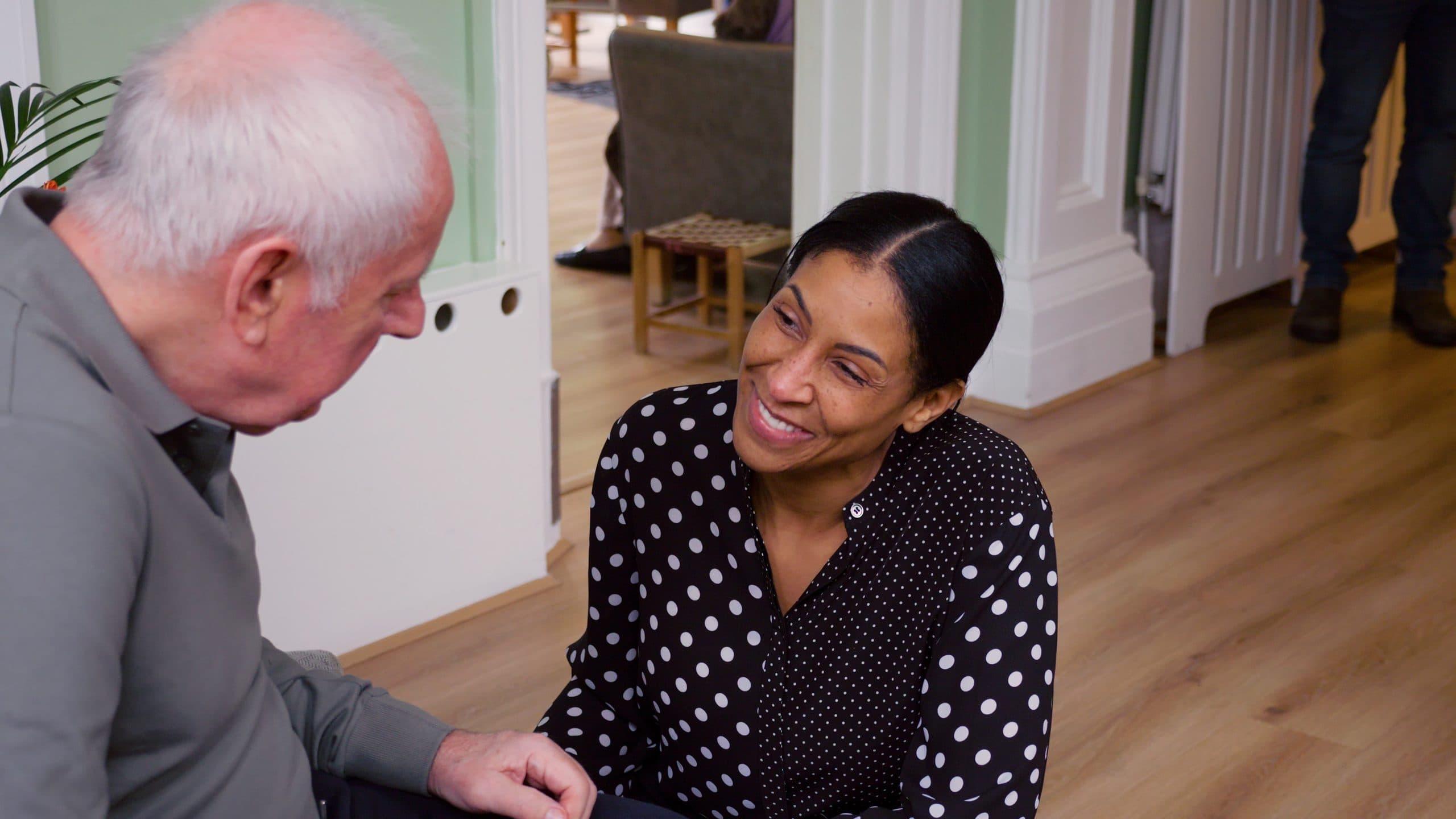 Catherine Paul, owner of Canwick House, sharing a moment with a resident